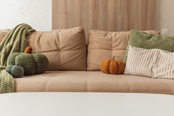 Autumn Living Room with Coffee Table,  Fabric Pumpkins, Cushions, and Cozy Textiles