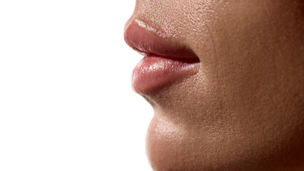 Obraz premium Female lips side view with smooth hydrated surface and natural gloss. Concept of cosmetic surgery aesthetic clinics, beauty skincare, and pharma derma cosmetics