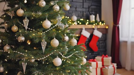 Festive Christmas tree decorated with sparkling ornaments glowing fairy lights cozy fireplace - Powered by Adobe