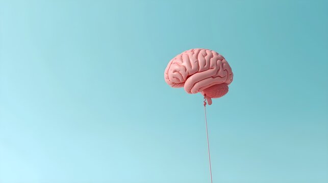 Pink Brain Balloon Against Aqua Sky Minimalist Concept