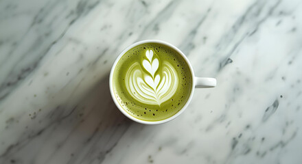 Elegant Matcha Latte with Heart Foam Art on Marble Surface – Modern Cafe Style Drink