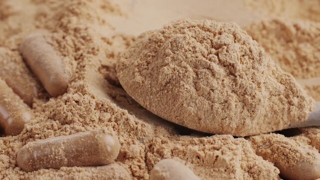 Ashwagandha Indian Ginseng Powder in White Bowl isolated on white background, superfood close up. 