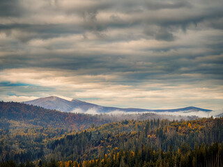 Misty Autumn Rain Clouds over Ukrainian Carpathian Mountains.