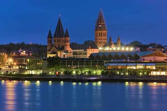 Mainz, Germany. Mainz Cathedral or St. Martin's Cathedral in dusk. View from opposite bank of the Rhine. The cathedral was founded in 975-976.