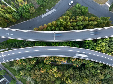 Aerial views of urban highways and interchanges at sunrise