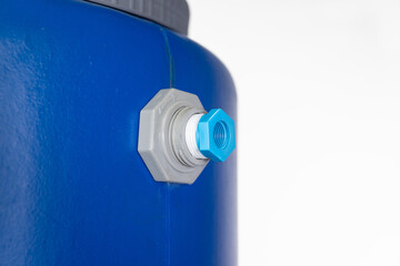 Plumber's Hand Wrapping White PTFE Thread Seal Tape Around a Bushing Reducer Coupling Pipe Fitting for Inlet