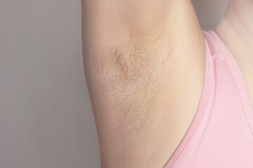 Hairy woman armpit. Natural body hair without shaving. Hairy woman. cropped close up photo