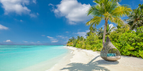 Best Maldives Beach Landscape for a Popular Summer Vacation Destination. Top Holiday Scenic View with Beautiful Palm Trees Swing, Relaxing Sea, White Sand, Bright Sky, and Gentle Waves. Perfect Travel
