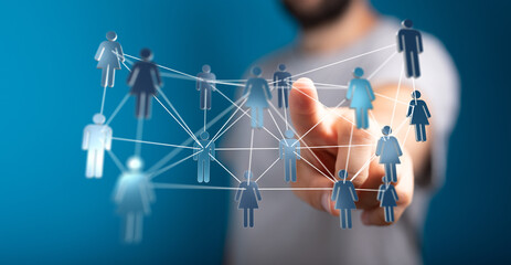 Abstract image showing a person interacting with a network of connected human figures. Represents concepts like networking, teamwork, and social