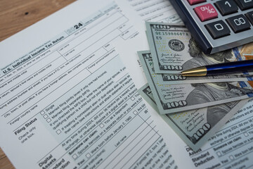 Obraz premium Accounting solutions: detailed look at financial forms, calculator, and cash