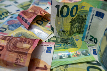 Euro banknotes background, concept of wealth, finance, investment and European economic stability