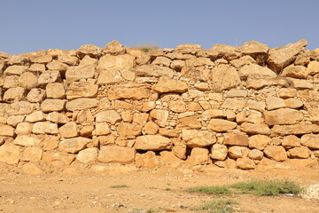 Ancient stone wall made of giant blocks in Akhtarin countryside, Aleppo, Syria. A rare...