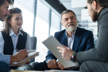 Business people, meeting and discussion with creative team for collaboration, planning or...