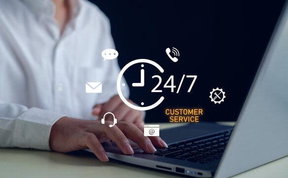 24-7 customer service concept with person typing on laptop and communication icons. Representing online support, call center, helpdesk, and business technology for clients anytime.