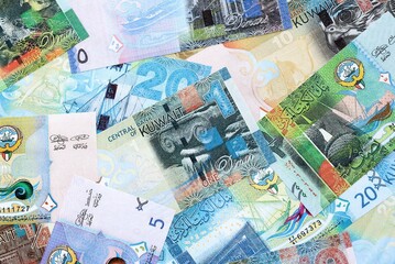 Kuwaiti dinar currency money bills. The current banknotes lies on table in big amount close up