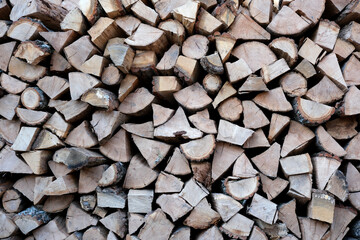 Stacked firewood ready for use during cozy winter nights
