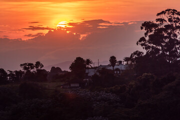 Sunset in the subiurbs with beautiful warm tones over the clouds