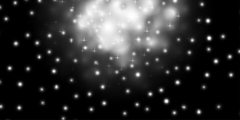 A black and white image showing some stars that look faintly. Realistic falling snow with white snowflakes, light effect. gray bokeh White and Silver lights on bokeh abstract background.