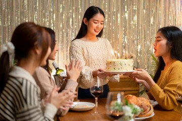 Young Adult Asian Women Celebrating Birthday Party With Cake Candles And Wine Enjoying Friendship Together Festive Gathering Happiness Concept