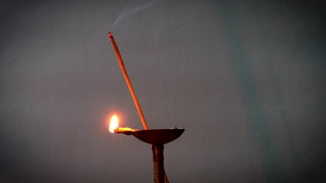 Burning earthen lamp or saki or diya and insense stick