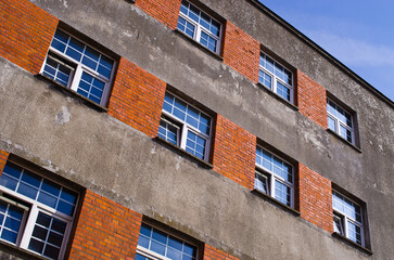 Old building facade with orange brick accents
