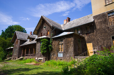 Explore historic abandoned mansion surrounded by lush green nature, Moja Wola, Poland