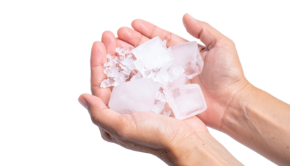 A person holding a handful of ice cubes. The ice appears clear and fresh, a visual representation of the concept of coldness