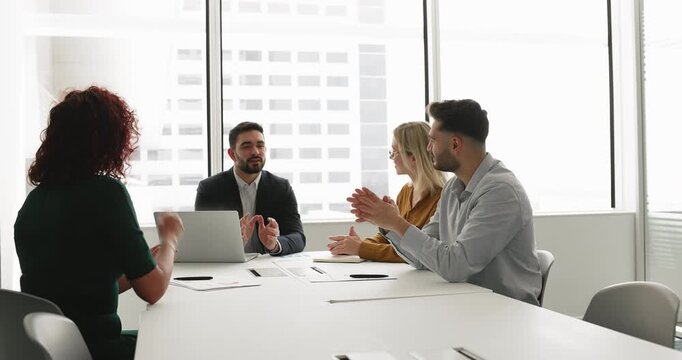 Young Middle Eastern business company leader holding meeting with stakeholders