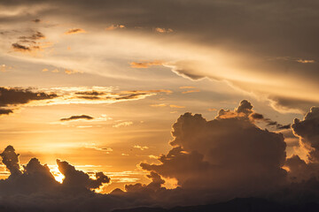 Orange clouds in the sky at sunset