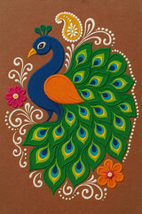 Obraz premium Indian culture traditional multi - colored grain Diwali Rangoli artwork Peacock Feather design