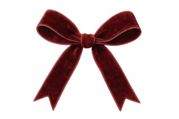 Red velvet ribbon bow adding a festive decorative element to gifts and celebrations, isolated with a transparent background
