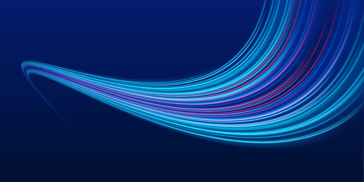 Long exposure of motorways as speed. Neon spiral lines in yellow blue and purple colors. Image of speed motion on the road.	