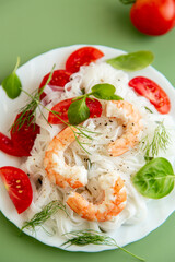 Light fitness salad of rice noodles shrimp and fresh herbs