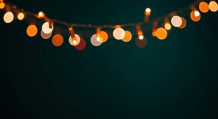A strand of glowing fairy lights creating a soft bokeh effect on a dark backdrop