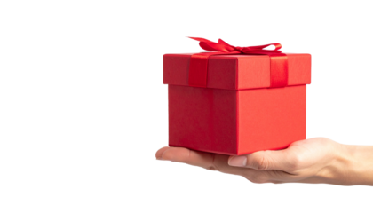 A hand holding a vibrant red gift box with a delicate red ribbon, ready for celebration. It's a symbol of generosity and thoughtfulness