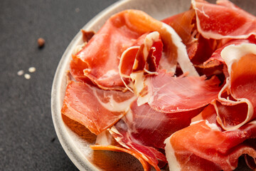 jamon serrano meat appetizer jamon iberico natural product tasty snack fresh delicious gourmet food background on the table rustic top view copy space