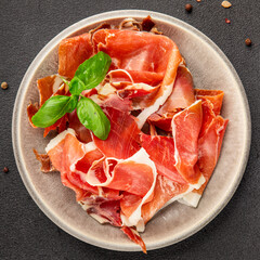 jamon serrano meat appetizer jamon iberico natural product tasty snack fresh delicious gourmet food background on the table rustic top view copy space