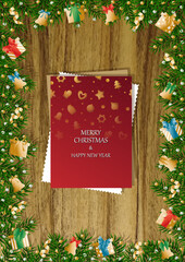 A wooden vertical surface decorated with Christmas decorations, a holiday card lies on the table, creating a warm festive atmosphere