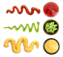 Mustard, mayonnaise, wasabi and ketchup on white background, set. Top view