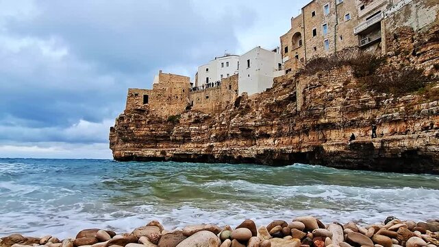 View from the pebble beach of the bay and sea in Polignano a Mare, Italy, Europe.