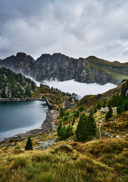 Dam of the reservoir at the Refugi dera Restanca, La Val d'Aran, Catalonia, Pyrenees mountains, Spain, Europe