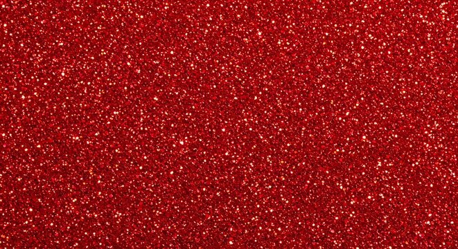 A textured background of shimmering red glitter with sparkling particles for festive design