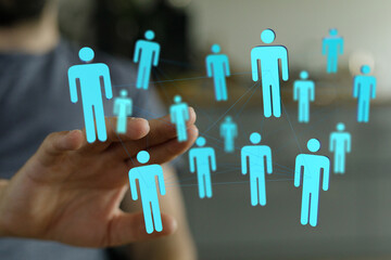 Abstract image representing a digital network, human connection, and social interaction with icons....