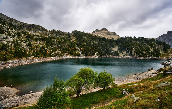 Dam of the reservoir at the Refugi dera Restanca, La Val d'Aran, Catalonia, Pyrenees mountains, Spain, Europe