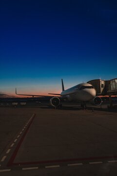 Airplane on Runway at Sunrise &ndash; Aviation and Travel Concept