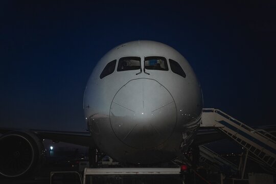 Nighttime Airplane Parked at Gate &ndash; Airport Runway Operations