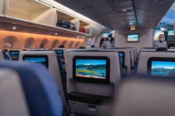 Airplane Cabin Interior with Passenger Seats and Screens &ndash; Modern Air Travel