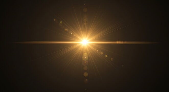 Bright golden lens flare effect with starburst and light streaks on a dark background