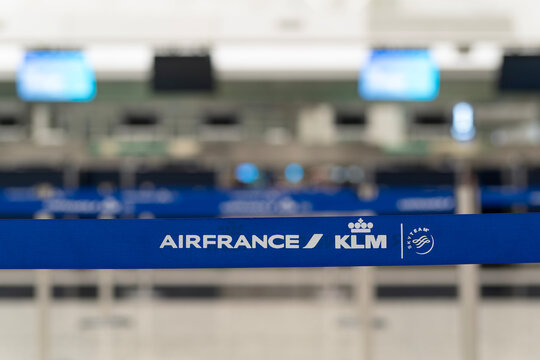 Air France - KLM sign on retractable belt barrier in Hong Kong Airport