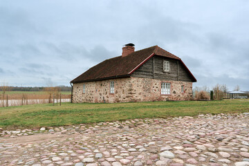 Historic Stone Wall Building at Nurme Manor, Latvia